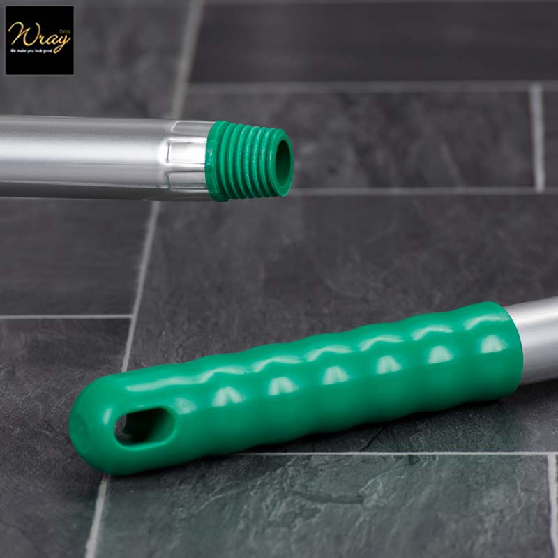 green coloured grip handle for brooms