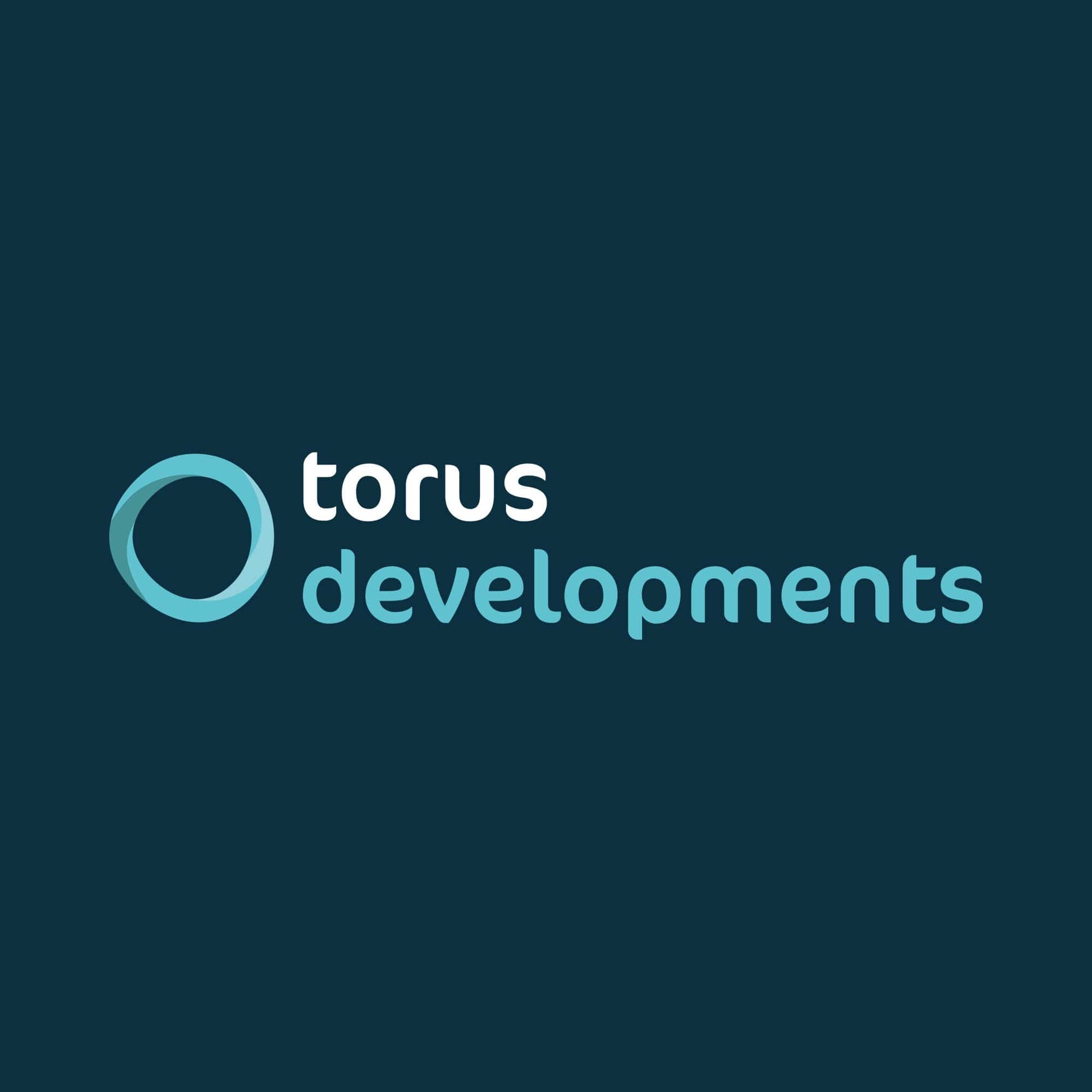 Torus Developments logo on a dark blue background