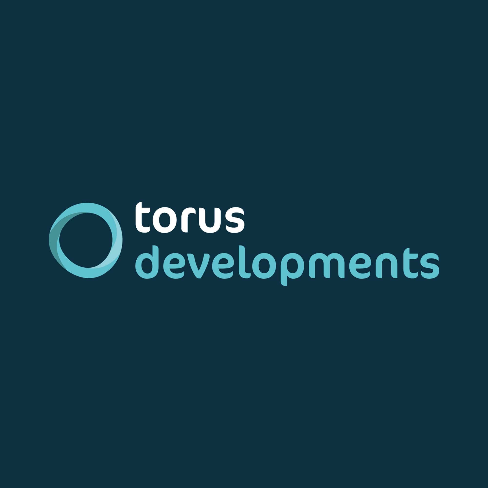 Torus Developments logo on a dark blue background