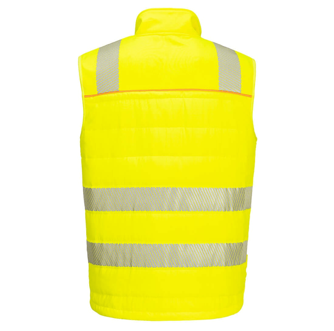 The DX4 Hi-Vis Hybrid Baffle Bodywarmer in YELLOW and BLACK combines high visibility with a modern design. It features a baffle quilted design for insulation and a durable, water-resistant outer layer. The bodywarmer is designed to keep the wearer warm and visible in challenging conditions, while offering comfort and flexibility. With its contrasting colors, it enhances safety and ensures practicality for work environments.
