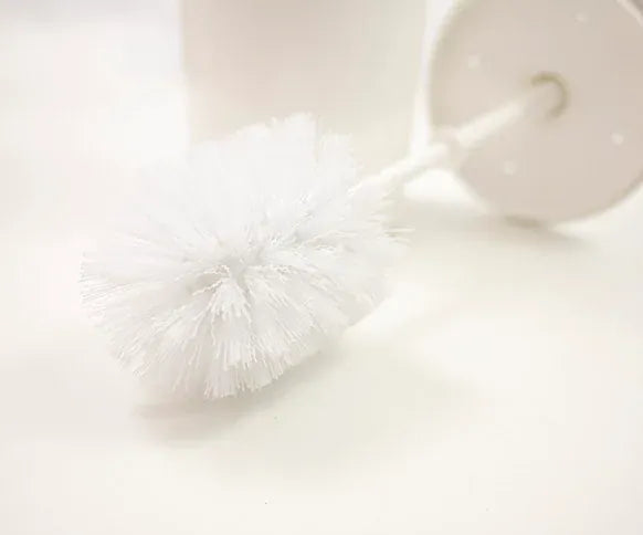 Close up shot of toilet brush from toilet brush set