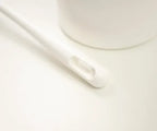 Close up shot of the end of a toilet brush