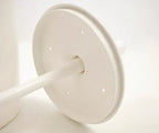 Close up shot of toilet brush set inside lid