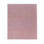 Cleaning cloth featuring a chevron pattern in red with white fade effect creating gentle wavy stripes