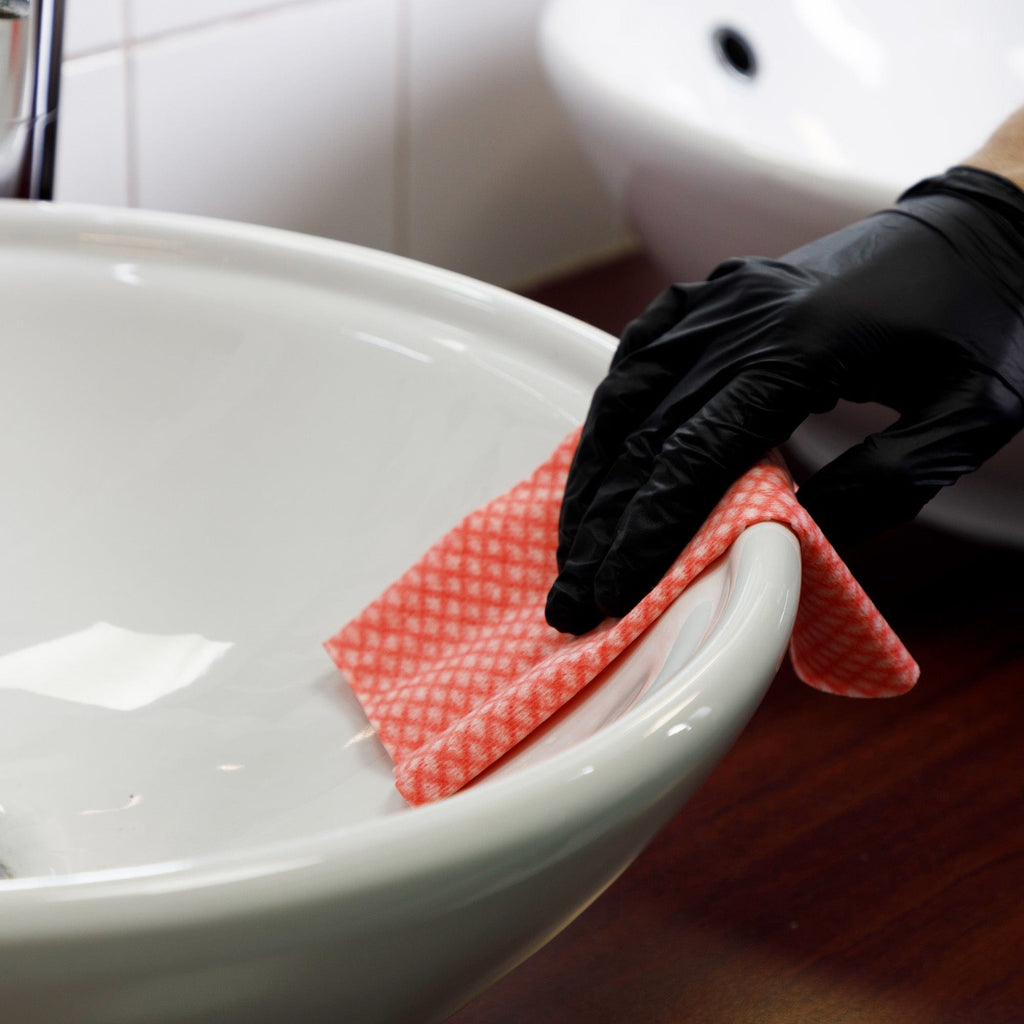 red cleaning cloth cleaning sink areas