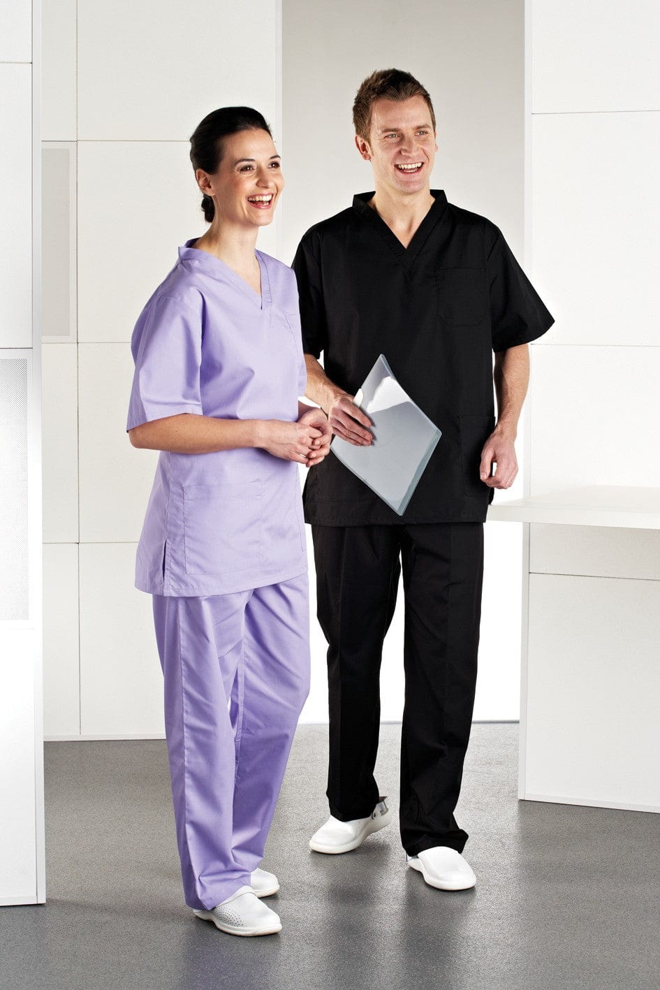 Two Models wearing Rizues Scrubs Suit Lilac and Black