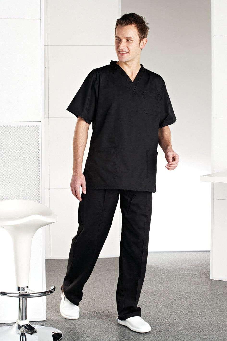 Models wears black Rizues Scrubs Suit