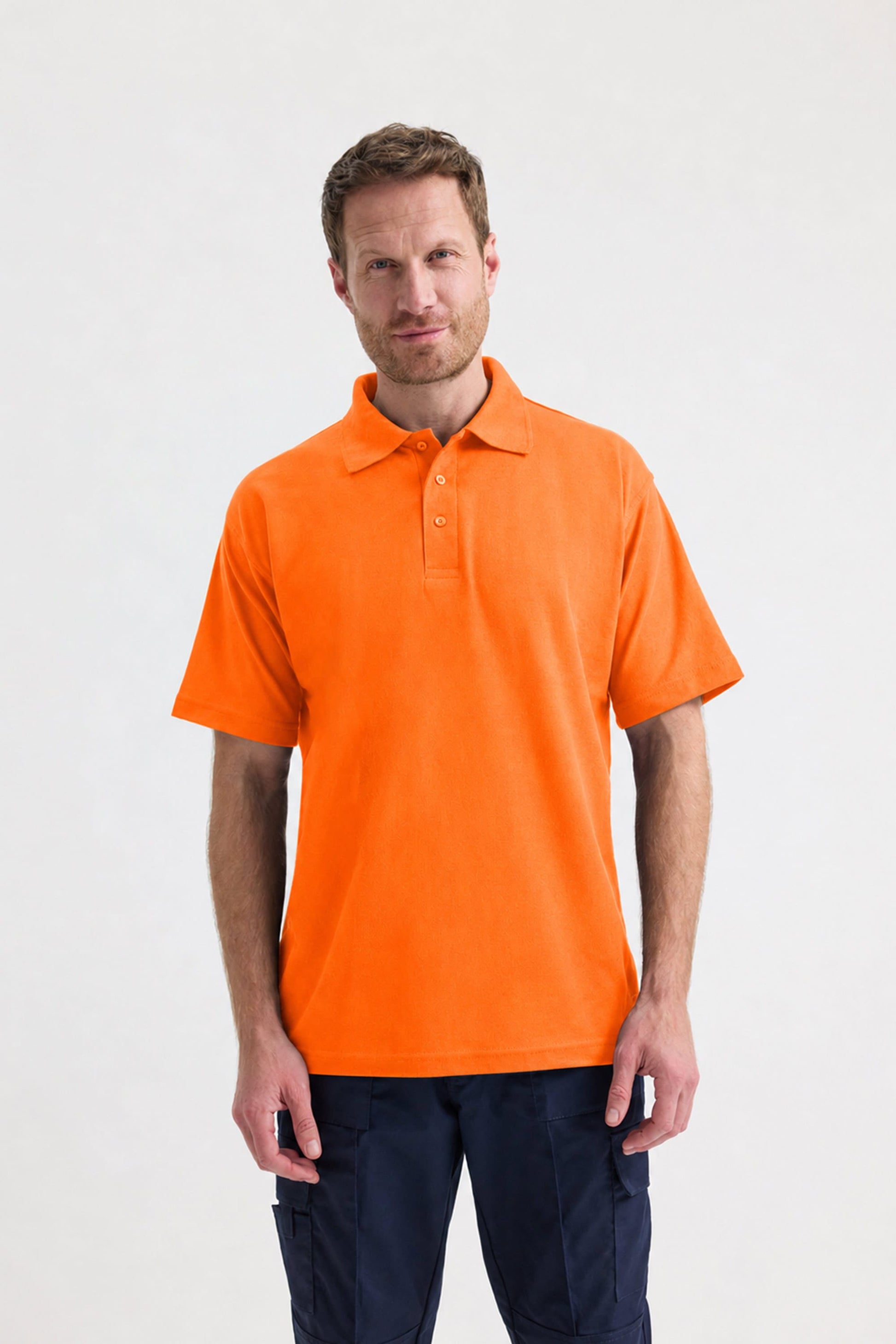 Man wearing an orange polo shirt against a white background