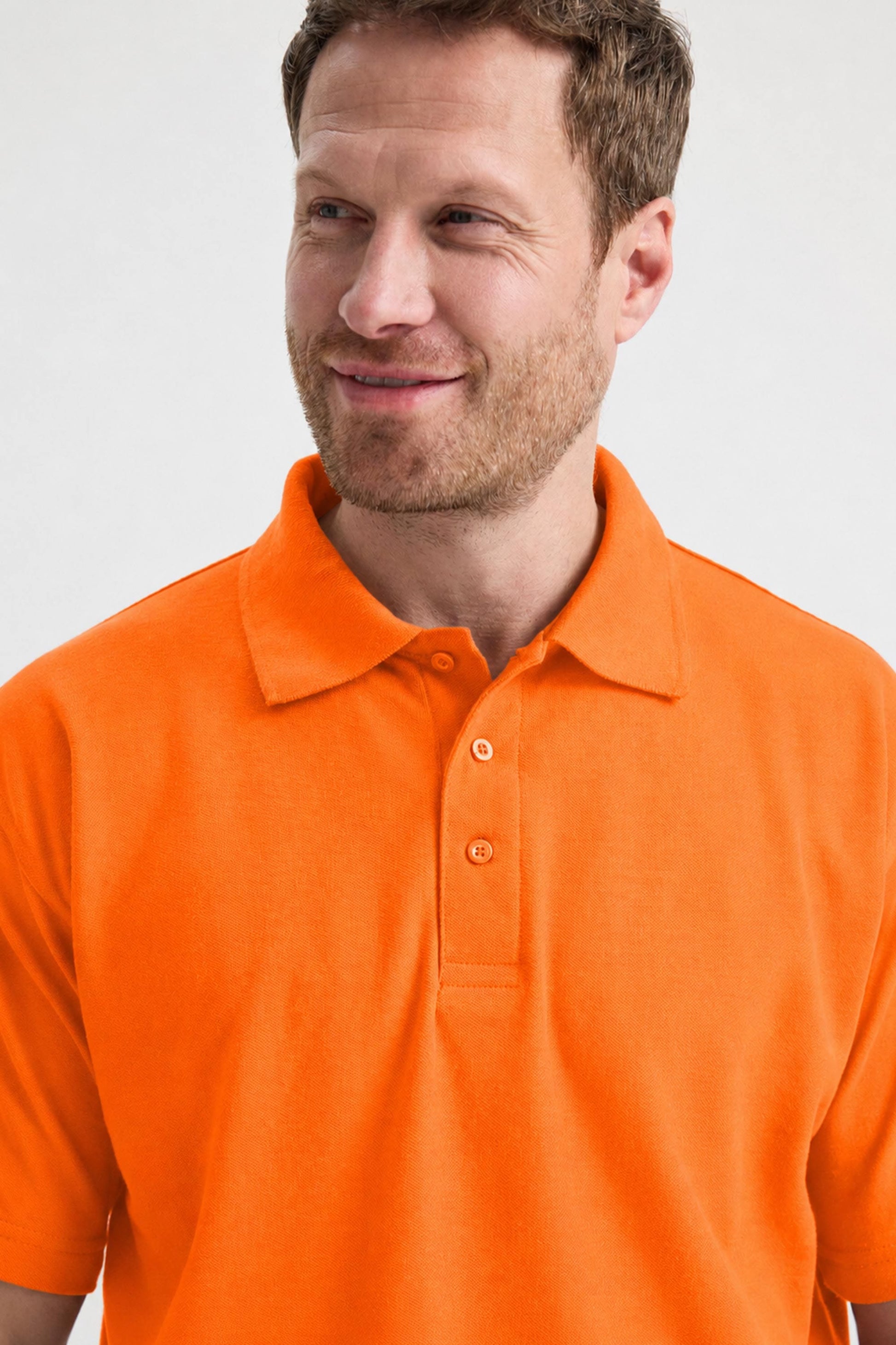 Man wearing an orange polo shirt against a white background