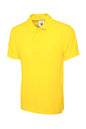 Yellow polo shirt on a white background
