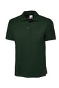 Green polo shirt on a white background