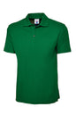 Green polo shirt with a brand label on a white background