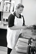 white dispsable aprons blue
