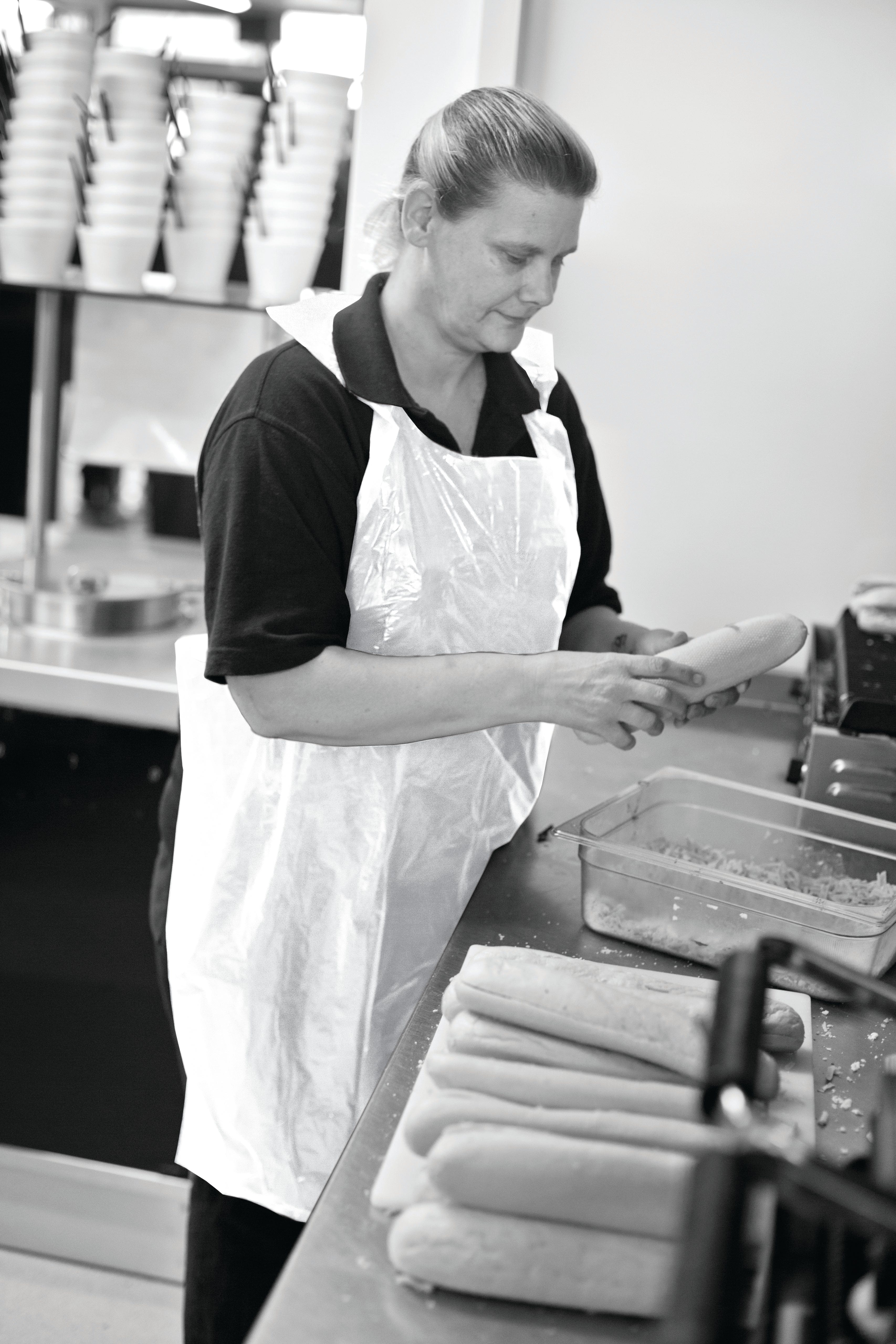 white dispsable aprons blue