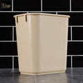 beige plastic wasite basket