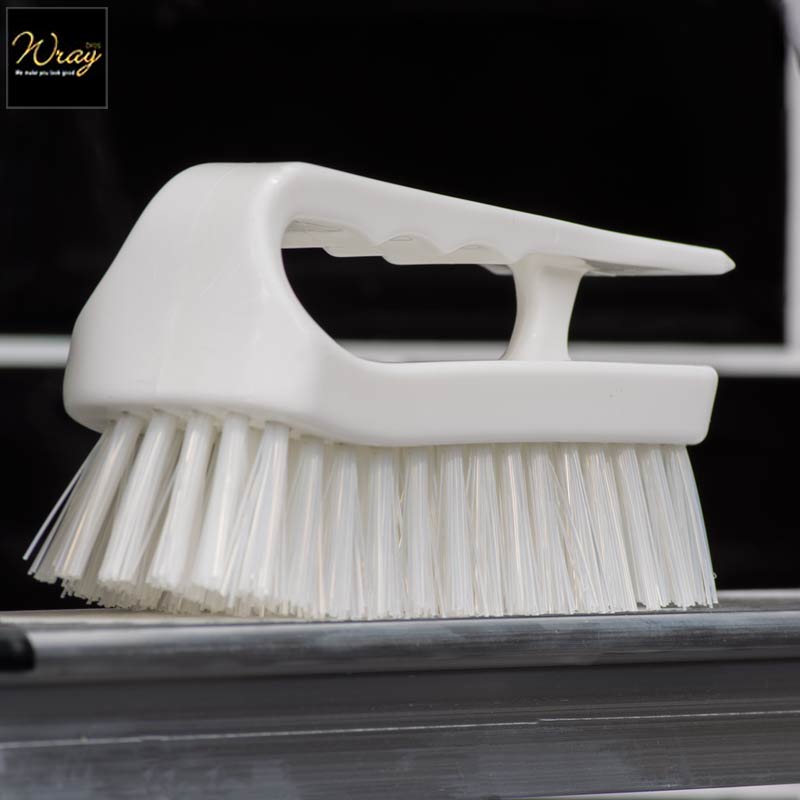white colour coded hand grippy brush