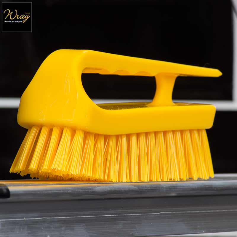 yellow hard scrubbing brush